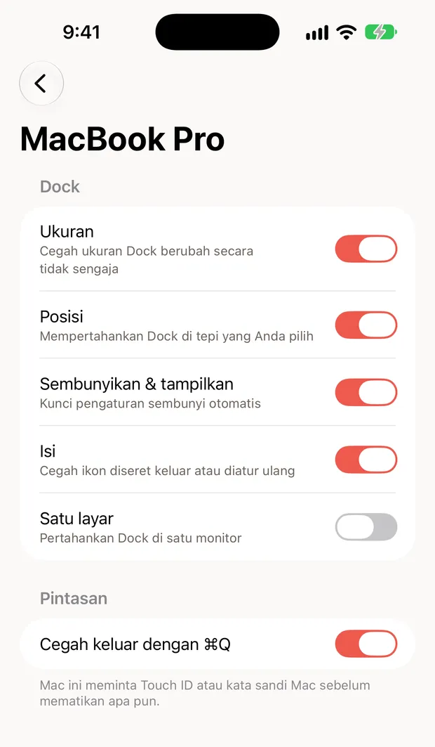 Still Dock di iPhone, menampilkan kunci sebuah Mac dengan sakelar