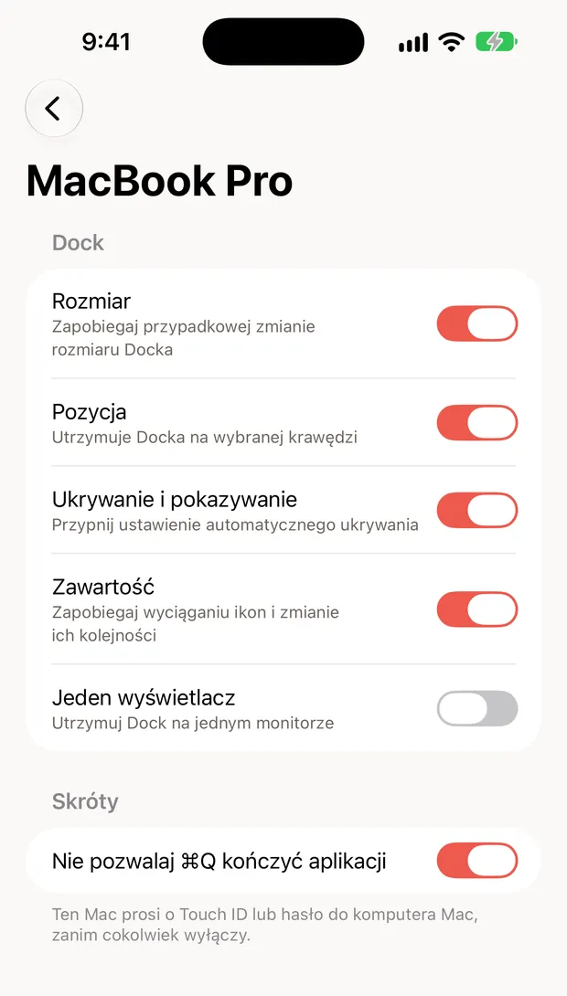 Still Dock na iPhonie, pokazujący blokady Maca z przełącznikami
