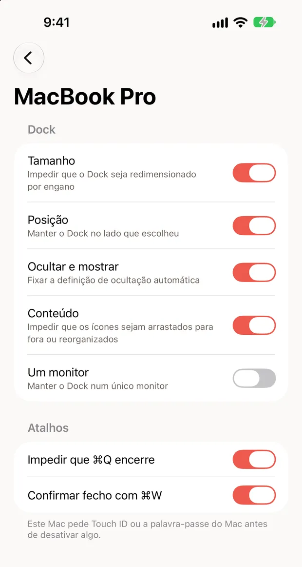 O Still Dock num iPhone, com os bloqueios de um Mac e respetivos interruptores
