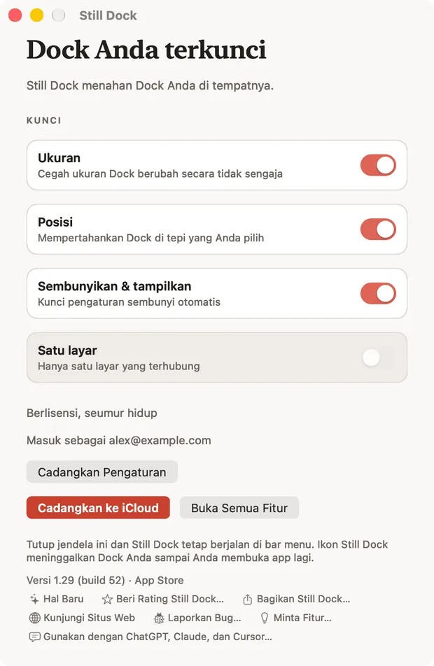 Jendela Still Dock di Mac, menampilkan kunci dan tujuh tindakan bantuan di bagian bawah