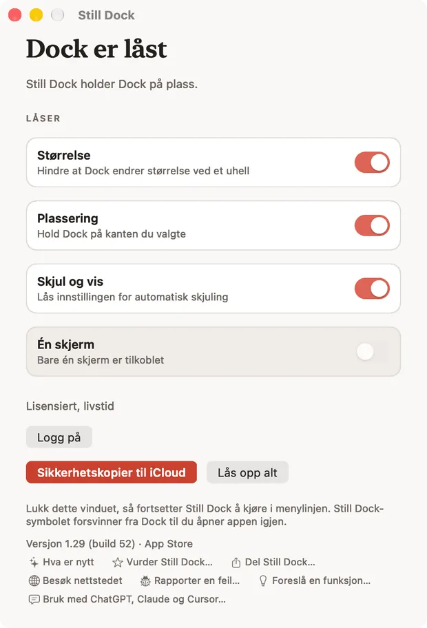 Still Dock-vinduet på en Mac, med låsene og de sju hjelpehandlingene langs bunnen